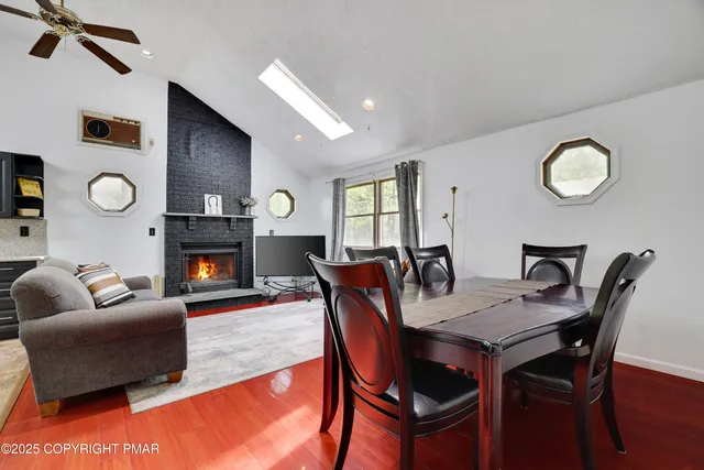 a view of a two chairs on the roof deck