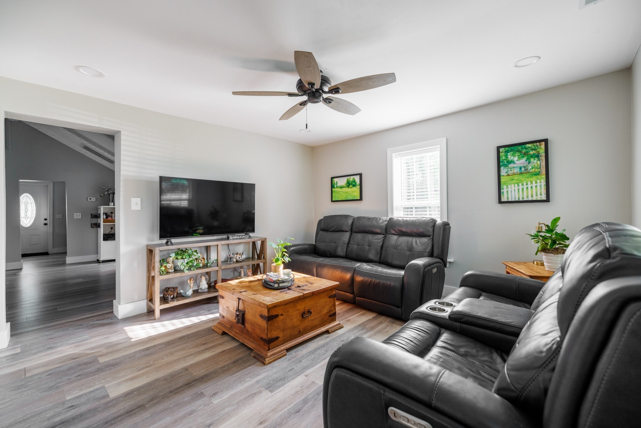 7365 Coldwater Road Fairview, TN 37062 - Photo 19 of 58 a living room with furniture and a flat screen tv