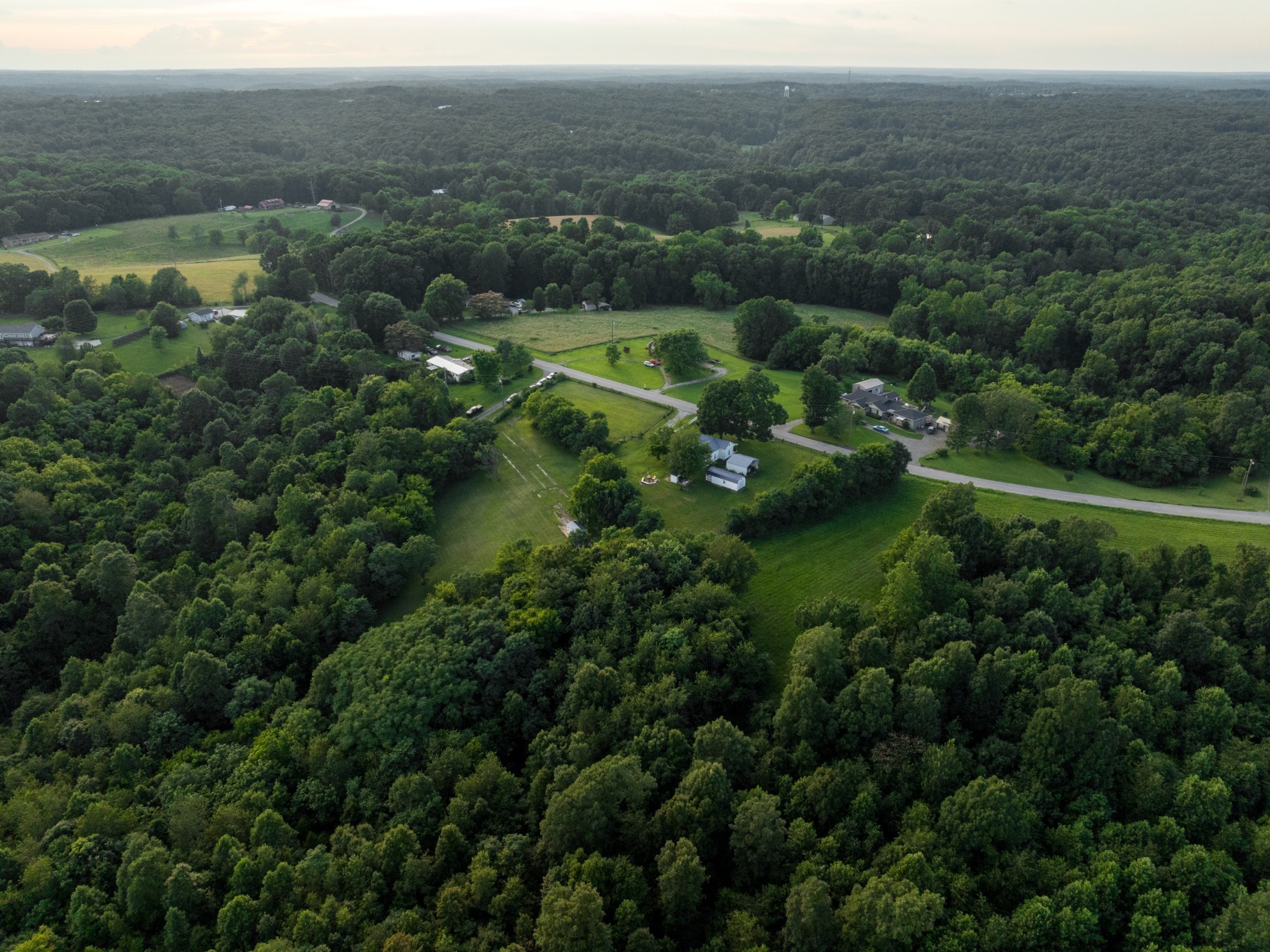 7365 Coldwater Road Fairview, TN 37062 - Photo 51 of 58 an aerial view of residential houses with outdoor space and trees