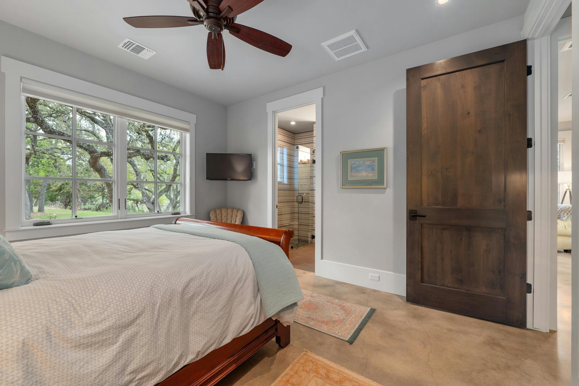 1330 Ranchers Club Lane Driftwood, TX 78619 - Photo 26 of 40 Bedroom featuring a ceiling fan, connected bathroom, and recessed lighting