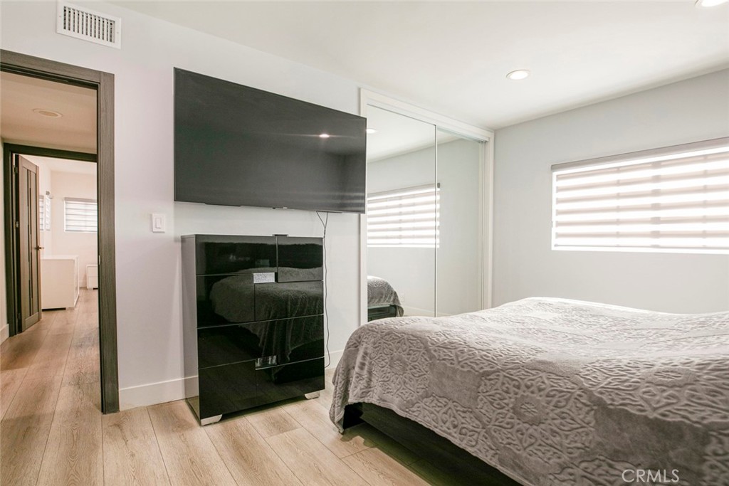 11836 Rialto Street Sun Valley, CA 91352 - Photo 13 of 23 a bedroom with a bed and a fireplace