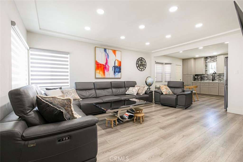 11836 Rialto Street Sun Valley, CA 91352 - Photo 4 of 23 a living room with furniture kitchen view and a large window