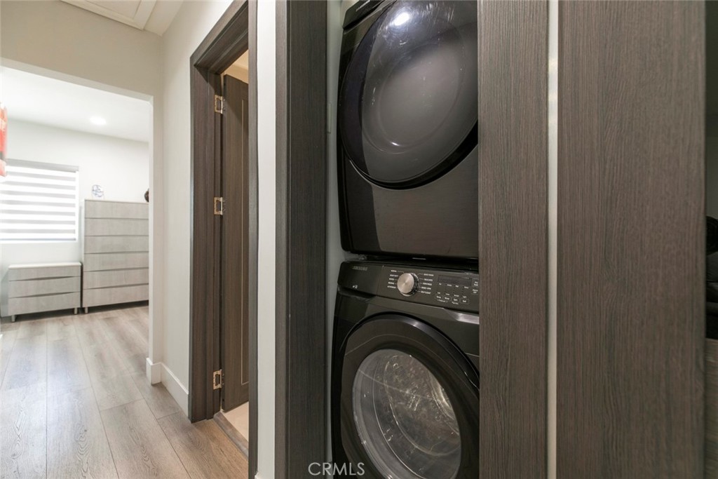 11836 Rialto Street Sun Valley, CA 91352 - Photo 10 of 23 a view of a hallway with washer and dryer