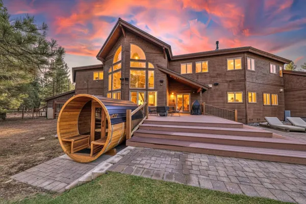 a view of a house with a swimming pool