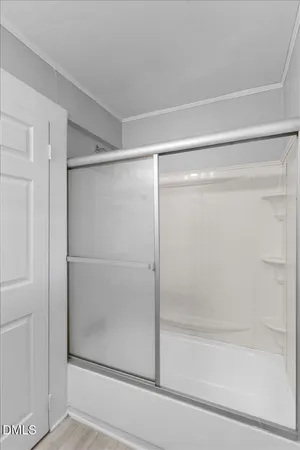 a utility room with sink dryer and washer