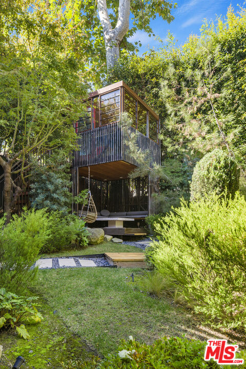 473 West Rustic Road Santa Monica, CA 90402 - Photo 13 of 34 a view of building with green space