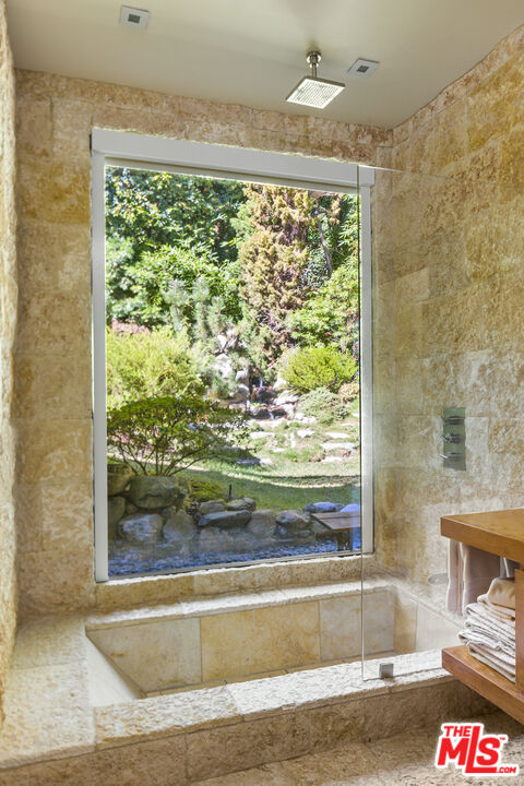 473 West Rustic Road Santa Monica, CA 90402 - Photo 19 of 34 a view of a living room and a floor to ceiling window