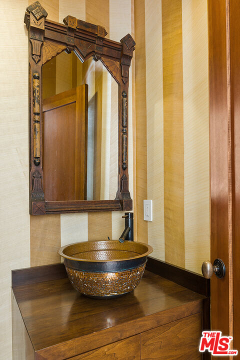 473 West Rustic Road Santa Monica, CA 90402 - Photo 20 of 34 a view of a sink sitting in a bathroom