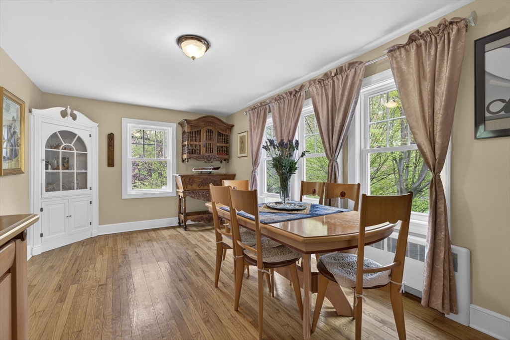 229 Parkerville Road Southborough, MA 01772 - Photo 37 of 38 a dining room with furniture and a window