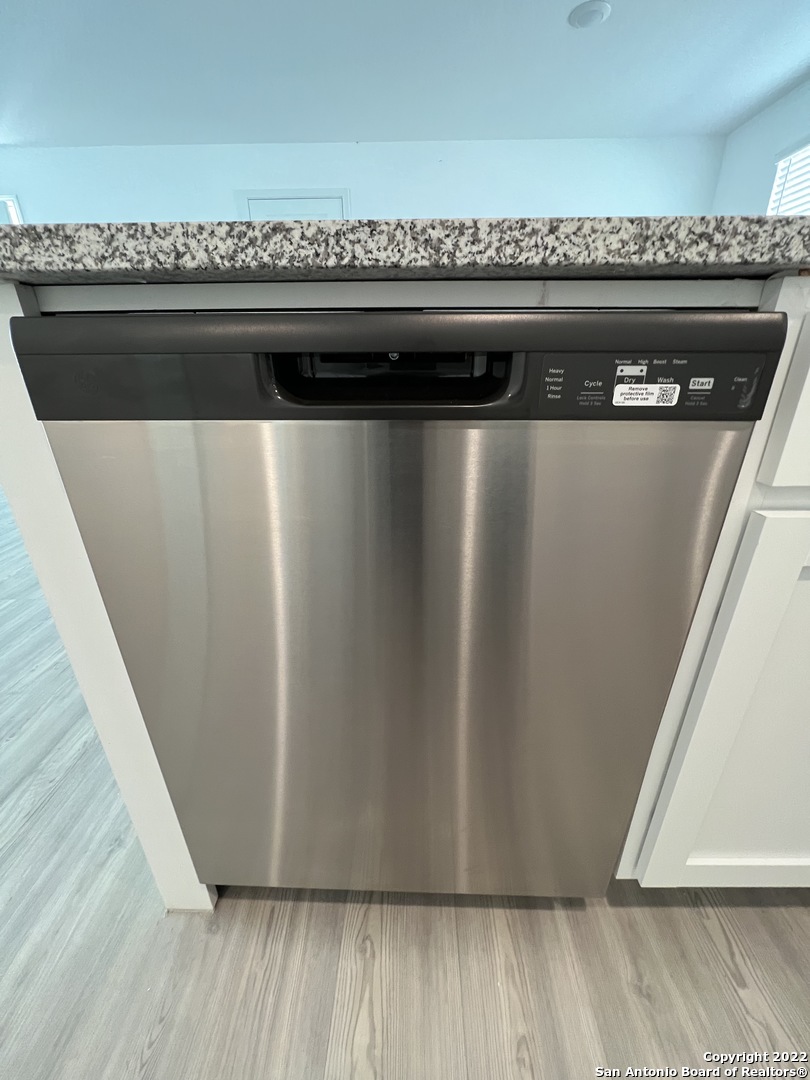 7314 Silos Ridge San Antonio, TX 78252 - Photo 13 of 45 a close view of a stove