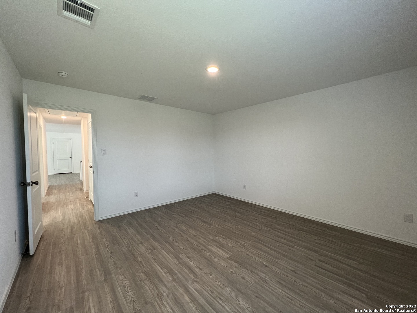 7314 Silos Ridge San Antonio, TX 78252 - Photo 30 of 45 a view of a room with wooden floor