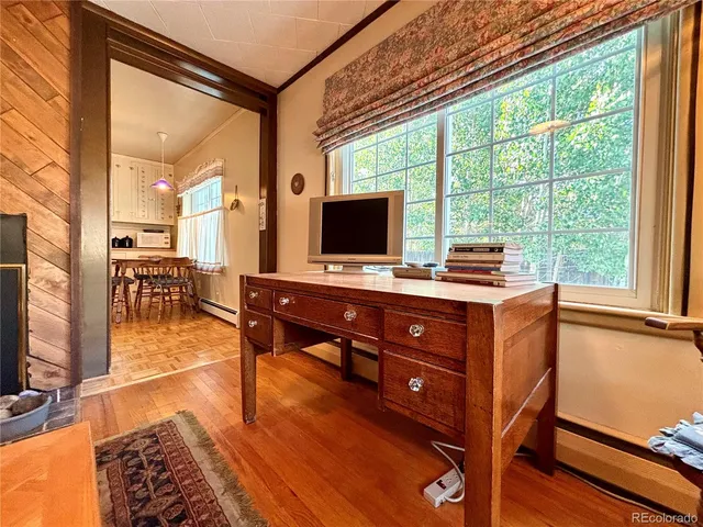 a room with furniture and a flat screen tv