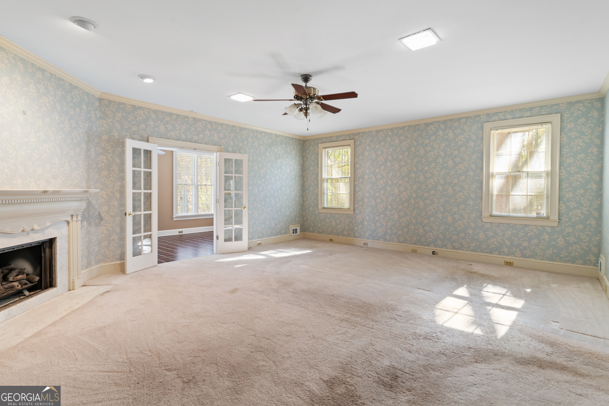 134 Brinson Road Waynesboro, GA 30830 - Photo 24 of 67 Owner's suite w/ fireplace, his & her full bathrooms and closets, and attached sunroom overlooking pool