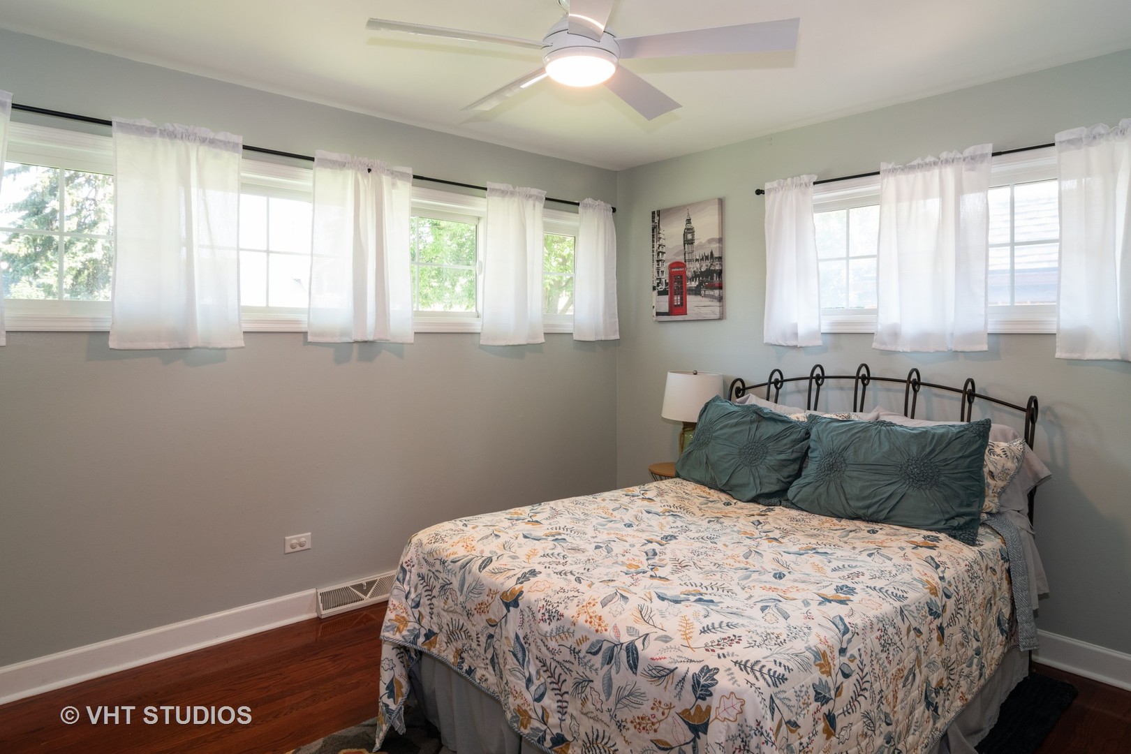 137 East Quincy Street Riverside, IL 60546 - Photo 6 of 14 a bedroom with a bed and window
