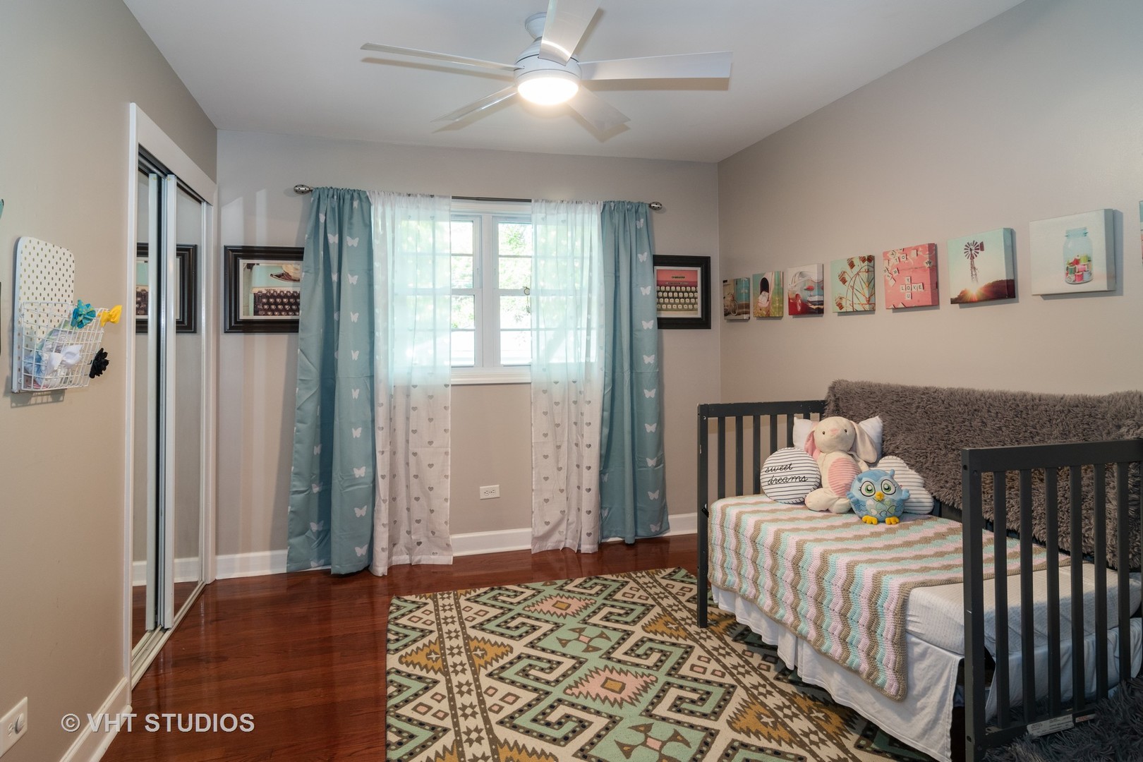 137 East Quincy Street Riverside, IL 60546 - Photo 7 of 14 a bedroom with a bed and a window