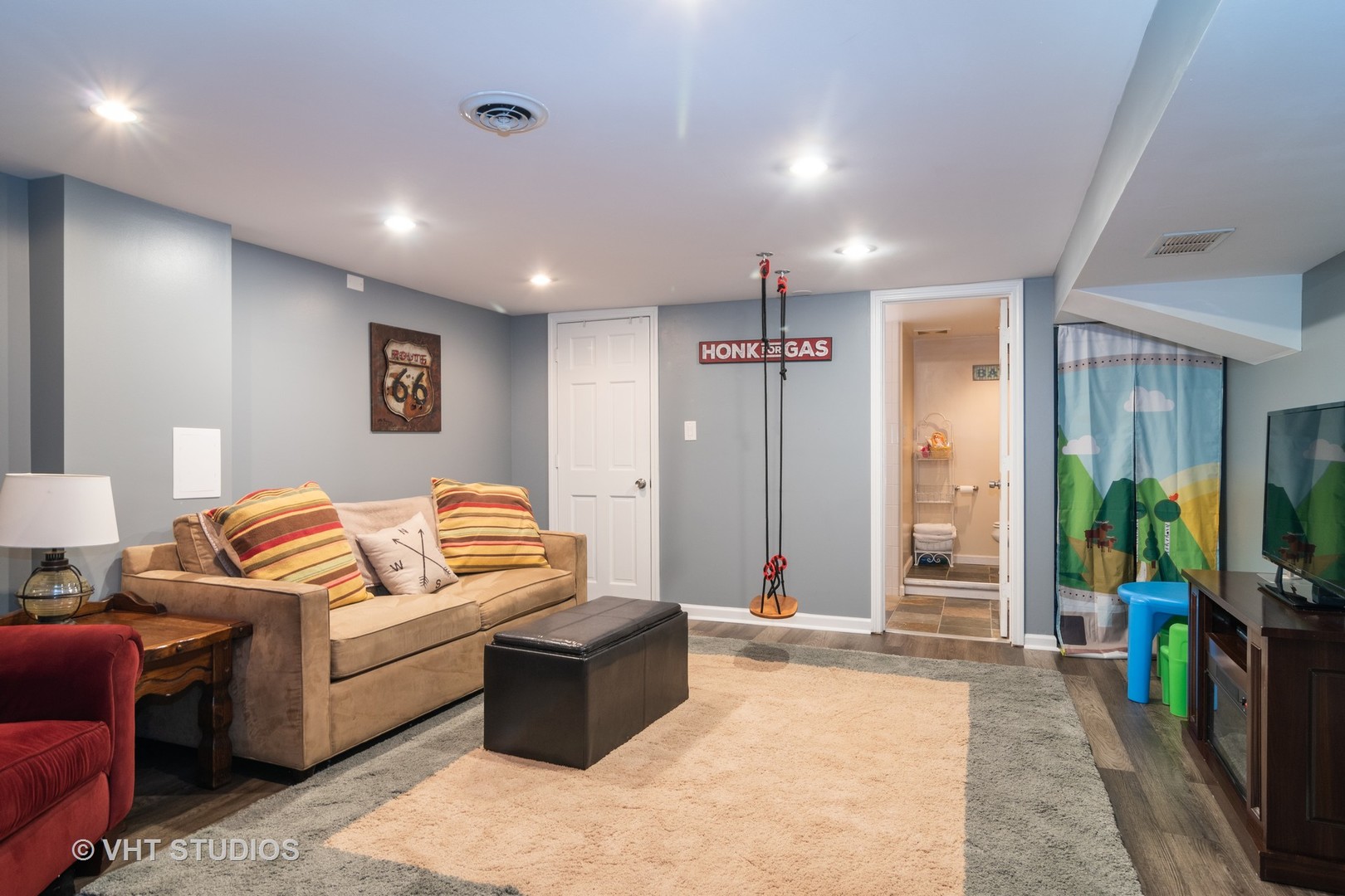 137 East Quincy Street Riverside, IL 60546 - Photo 8 of 14 a living room with furniture and a flat screen tv