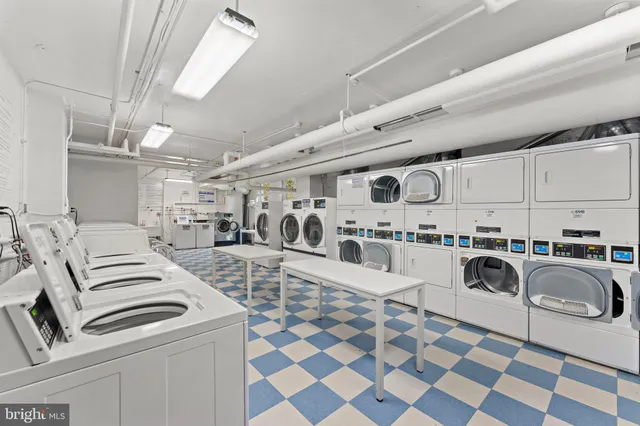 a living room with lots of appliances and furniture