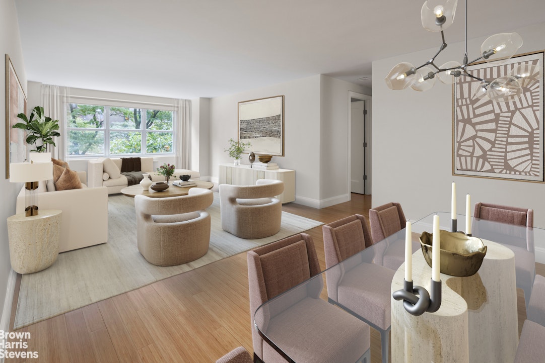 155 West 68th Street, Unit 28E Manhattan, NY 10023 - Photo 1 of 19 a living room with furniture and a large window