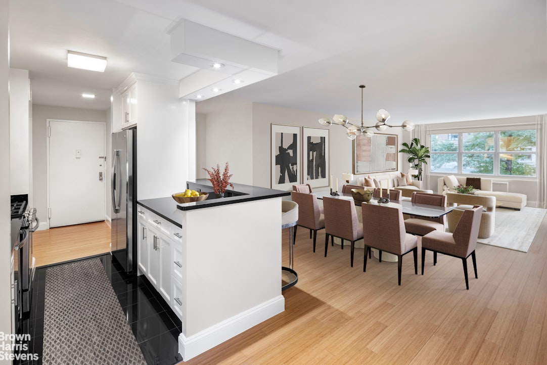 155 West 68th Street, Unit 28E Manhattan, NY 10023 - Photo 2 of 19 a very nice looking dining room with a large dining table and a large window with wooden floor
