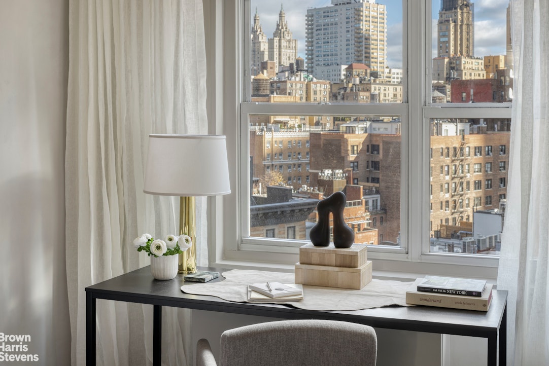 155 West 68th Street, Unit 28E Manhattan, NY 10023 - Photo 6 of 19 a view of a dining room with furniture and a window