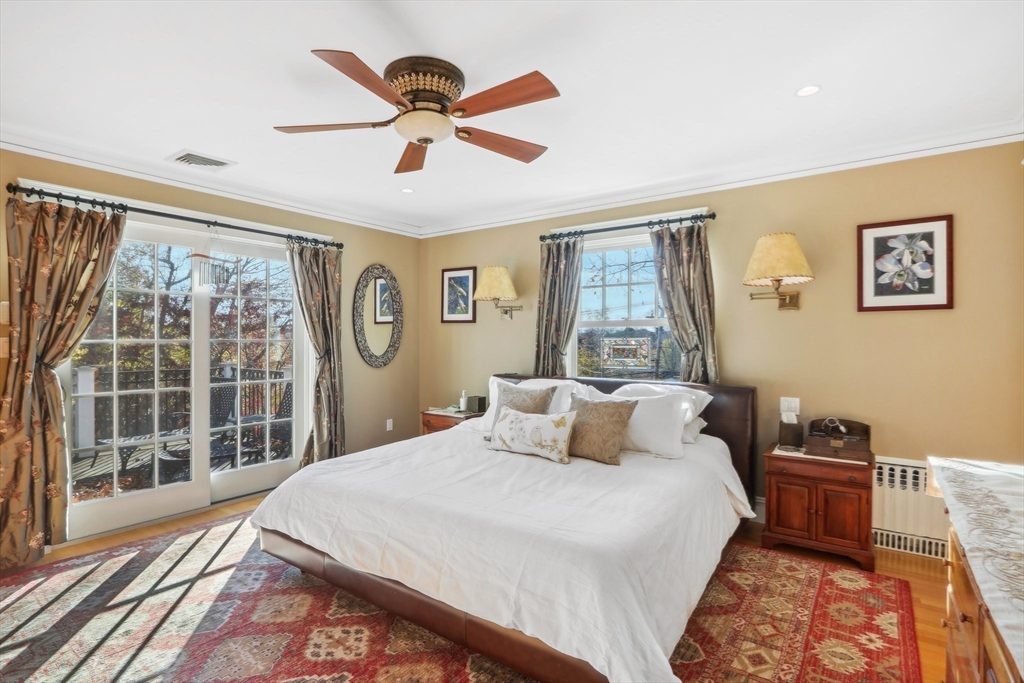 308 Prince Street Newton, MA 02465 - Photo 18 of 40 a bedroom with a large bed and a window