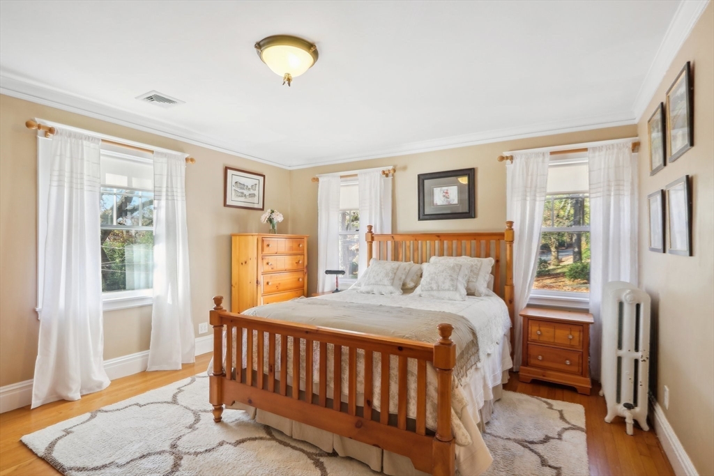 308 Prince Street Newton, MA 02465 - Photo 23 of 40 a bedroom with a bed and a window
