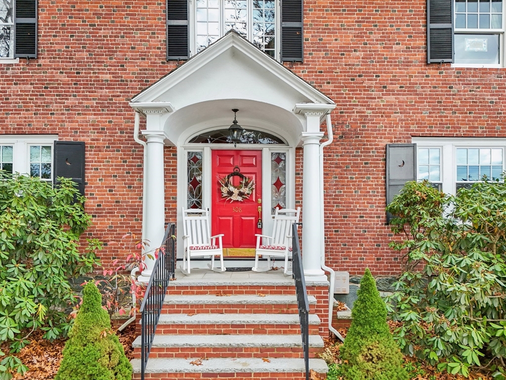 308 Prince Street Newton, MA 02465 - Photo 3 of 40 a front view of a house with a yard