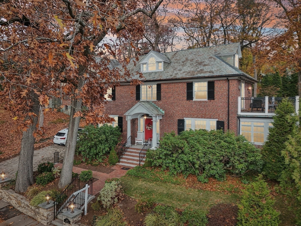 308 Prince Street Newton, MA 02465 - Photo 36 of 40 a front view of a house with a yard