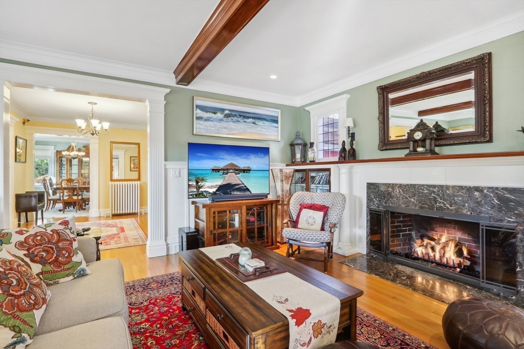 308 Prince Street Newton, MA 02465 - Photo 6 of 40 a living room with furniture and a fireplace