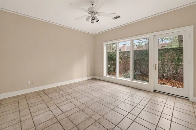 a view of an empty room and window
