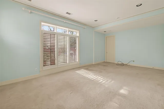 a bathroom with a double vanity sink mirror and