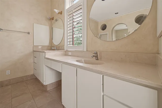 a white bath tub sitting in a bathroom