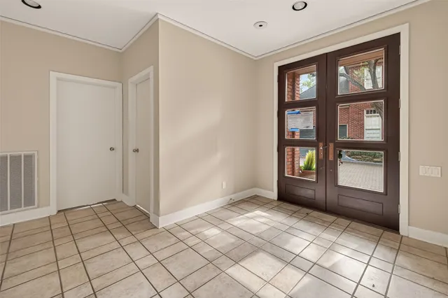 a view of an empty room and window