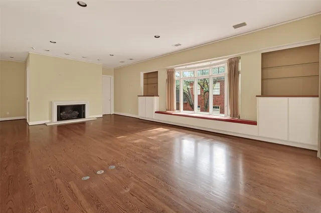 a view of a livingroom with wooden floor