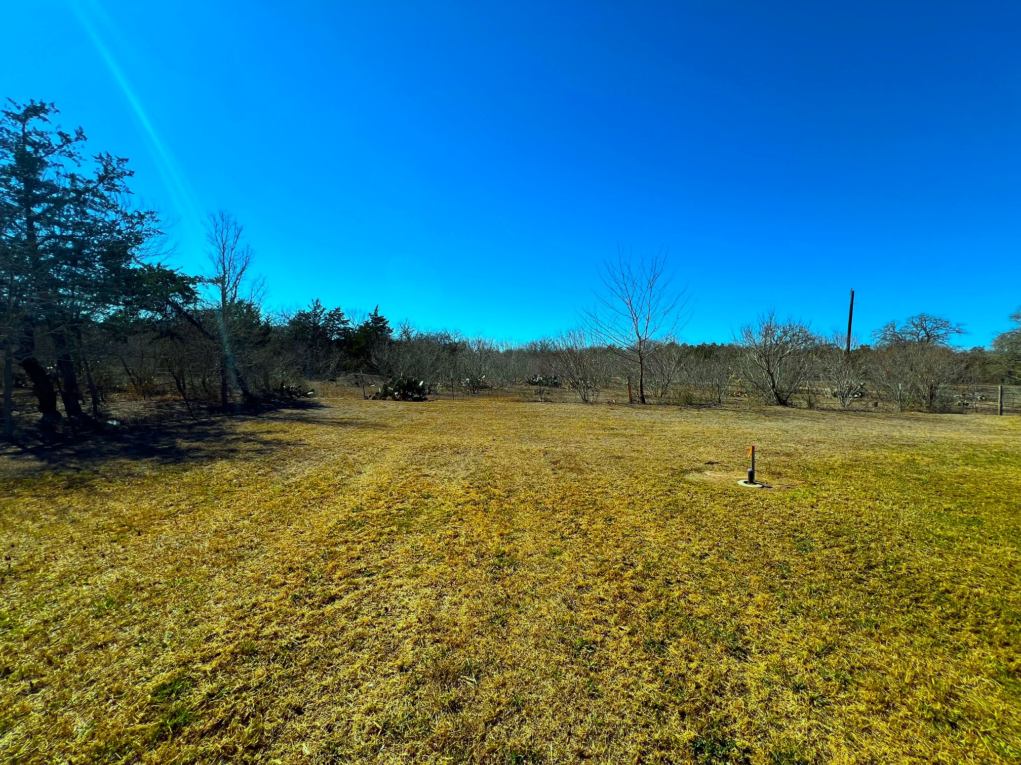 245 Mt Olive Road, Unit A & B Cedar Creek, TX 78612 - Photo 30 of 33 View of green lawn featuring a view of rural area