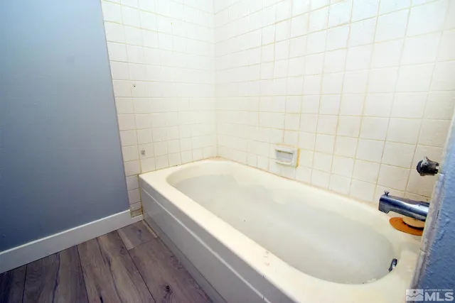 a bathroom with a bathtub