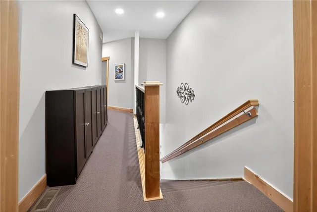a view of hallway with stairs