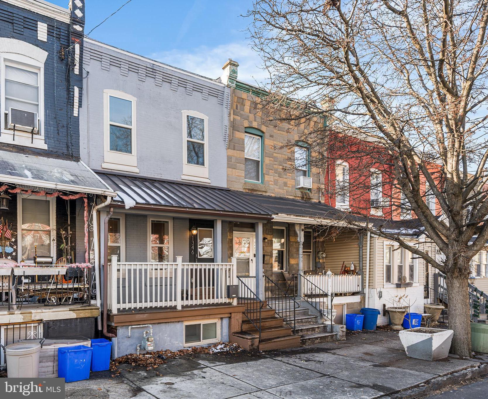 1346 South 46th Street Philadelphia, PA 19143 - Photo 32 of 32 a view of a brick house with many windows