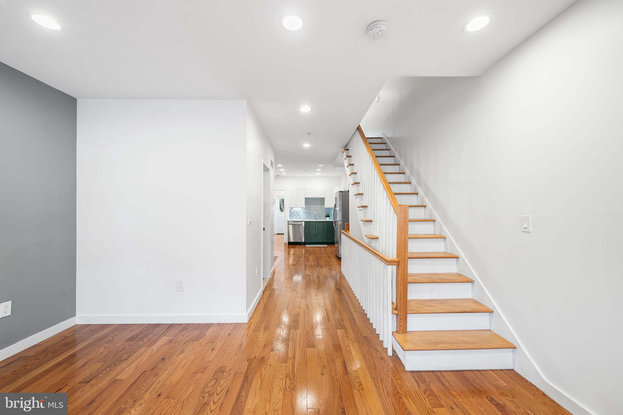 1346 South 46th Street Philadelphia, PA 19143 - Photo 8 of 32 a view of a hallway with wooden floor and staircase