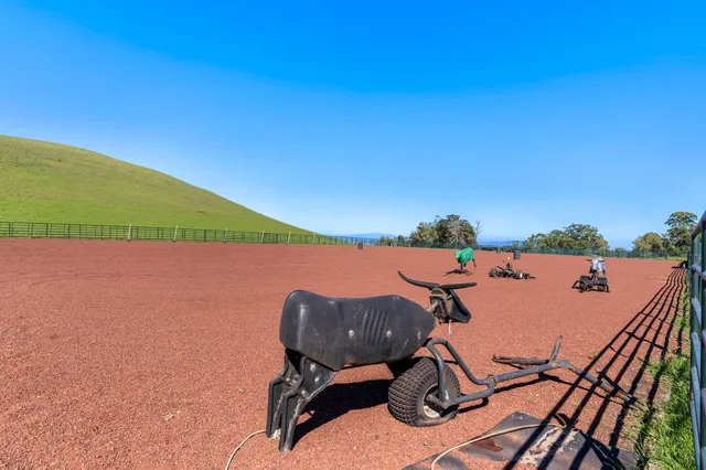 a view of a field with an outdoor space