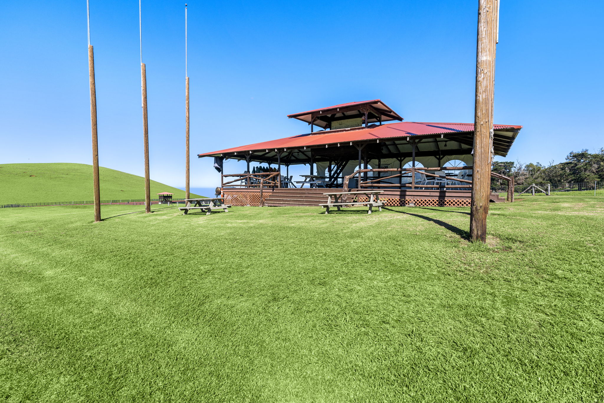 67-1148 Wainoenoe Road Kamuela, HI 96743 - Photo 17 of 27 a backyard of a house with table and chairs