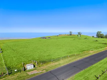 a view of a field with an outdoor space