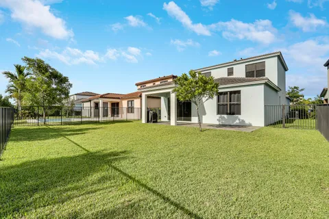 a front view of a house with swimming pool