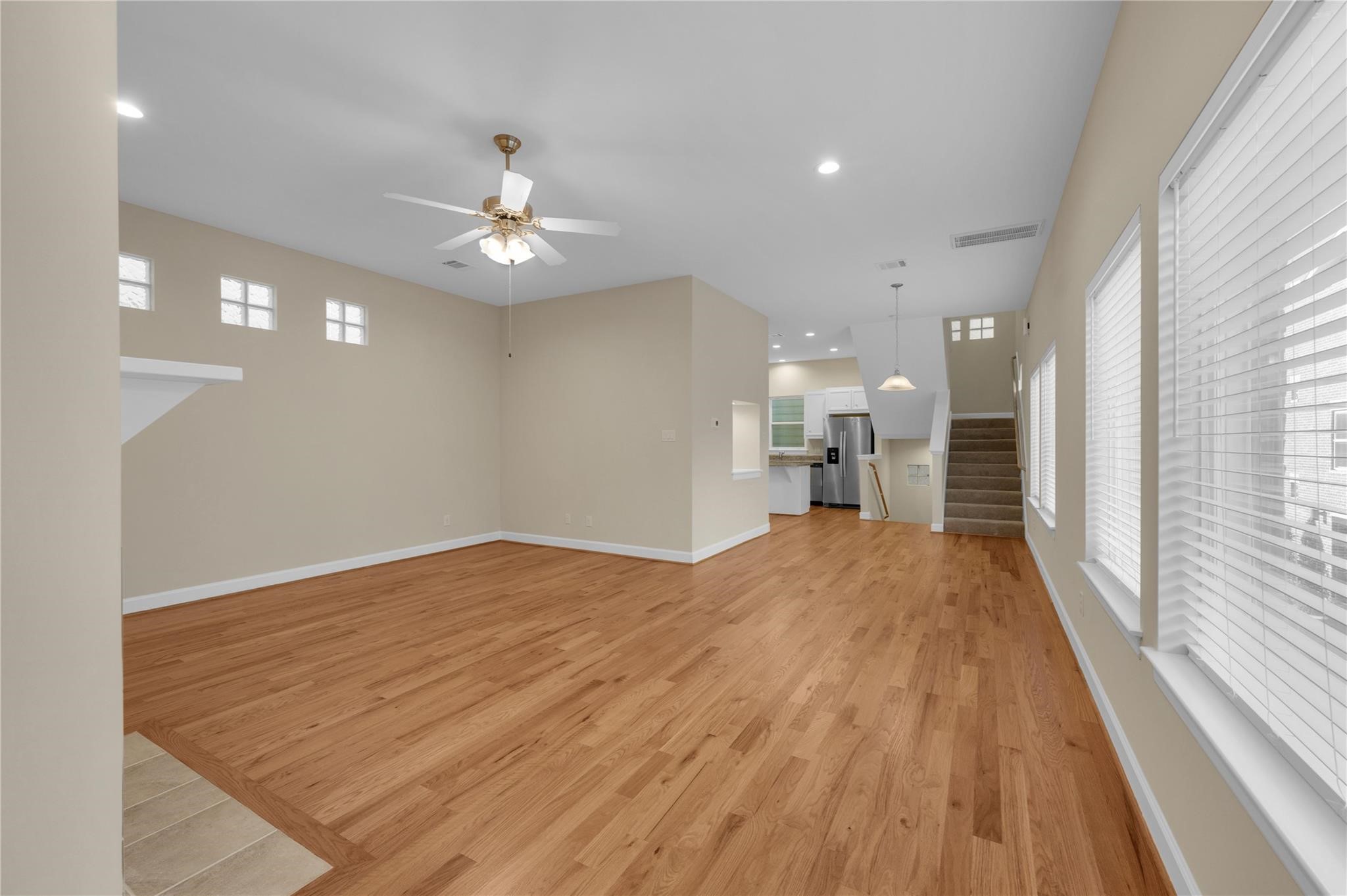 8731 Bryam Houston, TX 77061 - Photo 7 of 19 wooden floor in an empty room with a window