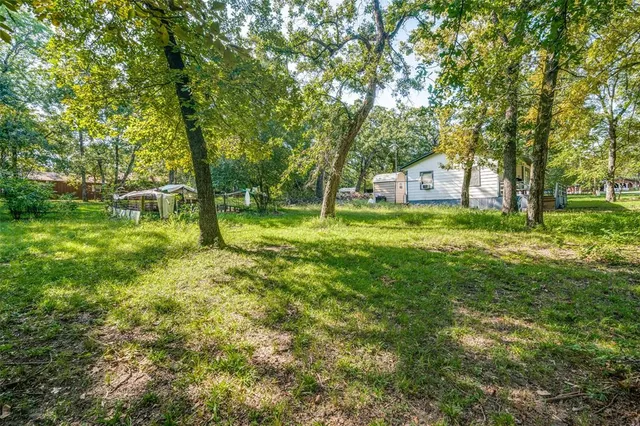 a fire hydrant in the middle of a field