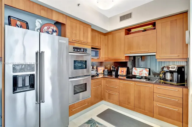 a large bathroom with a sink a toilet and shower