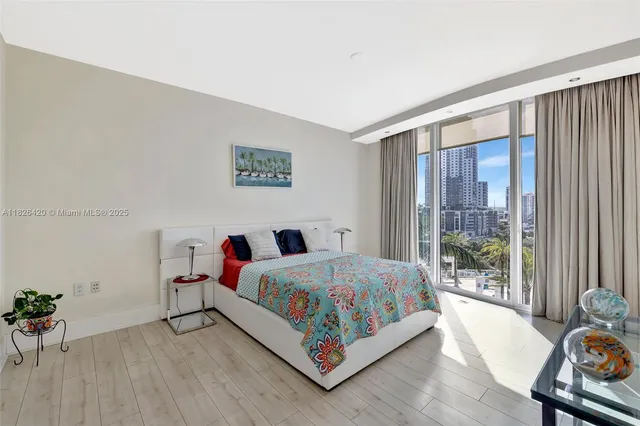 a bathroom with a sink toilet a mirror a bathtub and shower