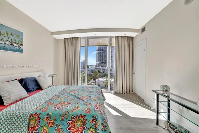 a bathroom with a bathtub and shower curtain