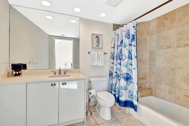 a view of a dining room with furniture wooden floor and chandelier