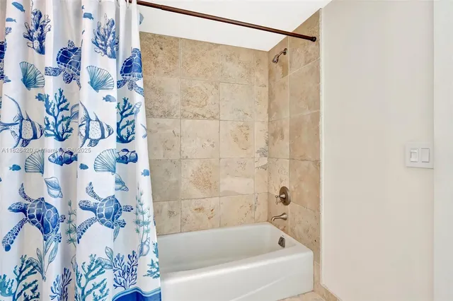 a view of a swimming pool with chair and tables